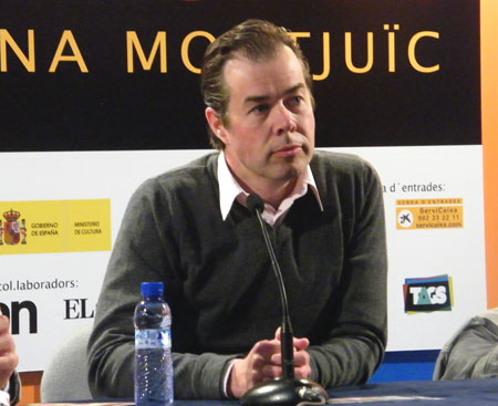 Stripintendant Gert Jan Pos houdt een persconferentie
in Barcelona over Nederland als gastland